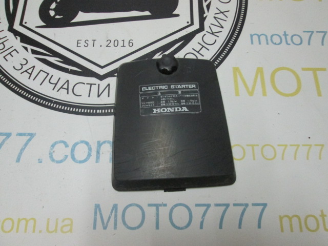 Лючок акб Honda Lead Delux AF01